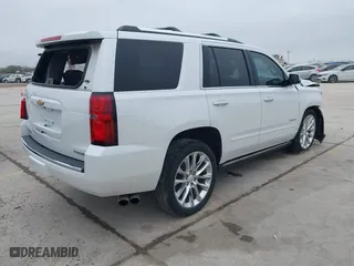 2019 Chevrolet Tahoe Premier with VIN 1GNSCCKJ4KR169077, listed as a IAAI auction lot 41548001 with 89,397 mi miles. Bid and sale history available at carsss.com. Image 4.