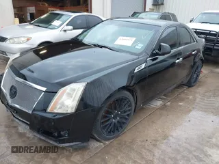 2008 Cadillac CTS RWD w/1SB with VIN 1G6DR57V780213337, listed as a IAAI auction lot 42004973 with 216,869 mi miles. Bid and sale history available at carsss.com. Image 2.