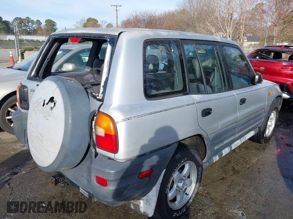 1997 Toyota RAV4 with VIN JT3HP10V7V7063874, listed as a IAAI auction lot 41711332 with 152,849 mi miles and . Bid and sale history available at DreamBid. Image 4.