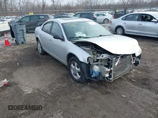 2005 Dodge Stratus SXT z VIN 1B3EL46R05N513027, wystawiony jako IAAI lot #41560225 z przebiegiem 213 877 mil mil oraz . Historia ofert i sprzedaży dostępna na DreamBid. Obrazek 1.