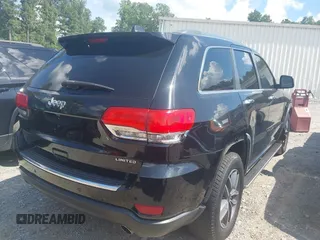 2019 Jeep Grand Cherokee Limited with VIN 1C4RJEBG7KC698975, listed as a IAAI auction lot 42700203 with 145,022 mi miles and . Bid and sale history available at DreamBid. Image 4.