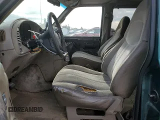 2000 Chevrolet Astro with VIN 1GNDM19W9YB191640, listed as a Copart auction lot 82247164 with 168,605 mi miles and Salvage Title. Bid and sale history available at carsss.com. Image 7.