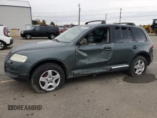 2004 Volkswagen Touareg with VIN WVGCM67L04D027410, listed as a Copart auction lot 79044964 with 100,509 mi miles and Salvage Title. Bid and sale history available at DreamBid. Image 1.