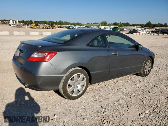 2010 Honda Civic Cpe LX with VIN 2HGFG1B67AH527237, listed as a Copart auction lot 71032914 with 184,842 mi miles and Salvage Title. Bid and sale history available at carsss.com. Image 3.