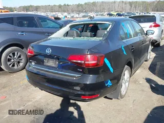 2017 Volkswagen Jetta SEL z VIN 3VWL17AJ5HM246543, wystawiony jako IAAI lot #41650614 z przebiegiem 112 168 mil mil oraz . Historia ofert i sprzedaży dostępna na DreamBid. Obrazek 4.