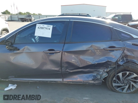 2017 Honda Civic EX z VIN 19XFC2F7XHE056273, wystawiony jako IAAI lot #42087934 z przebiegiem 95 871 mil mil oraz . Historia ofert i sprzedaży dostępna na DreamBid. Obrazek 15.