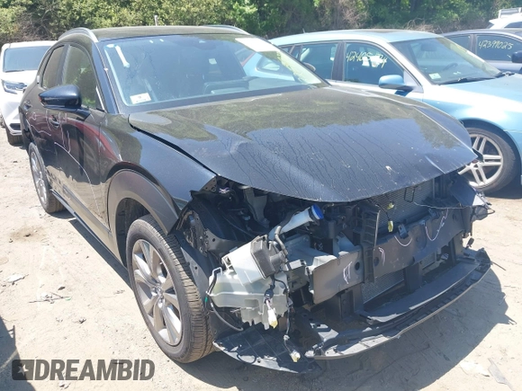 2022 Mazda CX-30 S Carbon Edition with VIN 3MVDMBCL3NM440188, listed as a IAAI auction lot 42259723 with 48,555 mi miles and . Bid and sale history available at DreamBid. Image 1.