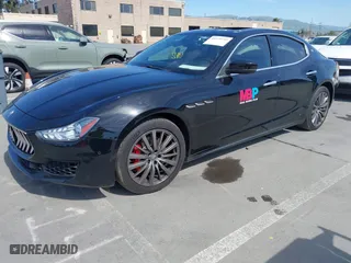 2019 Maserati Ghibli with VIN ZAM57XSA5K1328183, listed as a IAAI auction lot 41970101 with 61,260 mi miles. Bid and sale history available at carsss.com. Image 17.