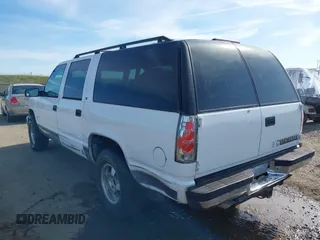 1997 Chevrolet Suburban with VIN 3GNFK16R4VG126095, listed as a IAAI auction lot 41548470 with 290,502 mi miles. Bid and sale history available at carsss.com. Image 3.