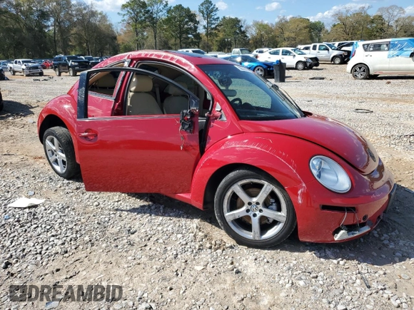 2009 Volkswagen Beetle S with VIN 3VWRG31C39M514610, listed as a Copart auction lot 50376005 with 56,816 mi miles and Salvage title. Bid and sale history available at DreamBid. Image 4.