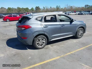 2018 Hyundai Tucson SEL with VIN KM8J3CA48JU718402, listed as a IAAI auction lot 41810363 with 218,853 mi miles. Bid and sale history available at carsss.com. Image 4.