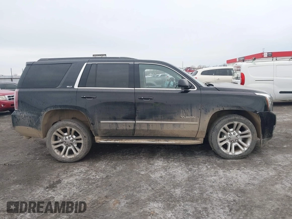 2016 GMC Yukon SLT with VIN 1GKS1BKC9GR480199, listed as a IAAI auction lot 41352032 with 146,716 mi miles. Bid and sale history available at carsss.com. Image 13.