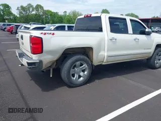 2015 Chevrolet Silverado 1500 LT with VIN 3GCUKREC1FG392218, listed as a IAAI auction lot 42094309 with 140,915 mi miles and . Bid and sale history available at DreamBid. Image 4.