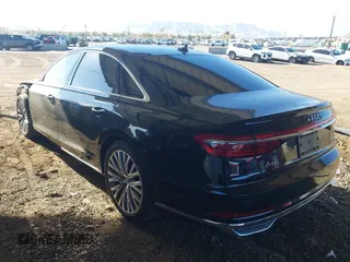 2019 Audi A8 L with VIN WAU8DAF83KN002810, listed as a IAAI auction lot 41588169 with 64,323 mi miles. Bid and sale history available at carsss.com. Image 3.