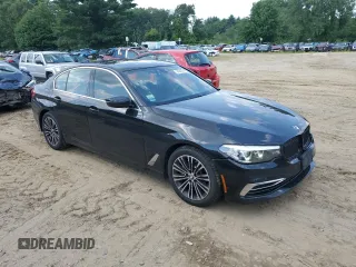 2020 BMW 5 Series with VIN WBAJB1C03LCD19170, listed as a Copart auction lot 64942594 with 66,584 mi miles and Salvage title. Bid and sale history available at DreamBid. Image 4.