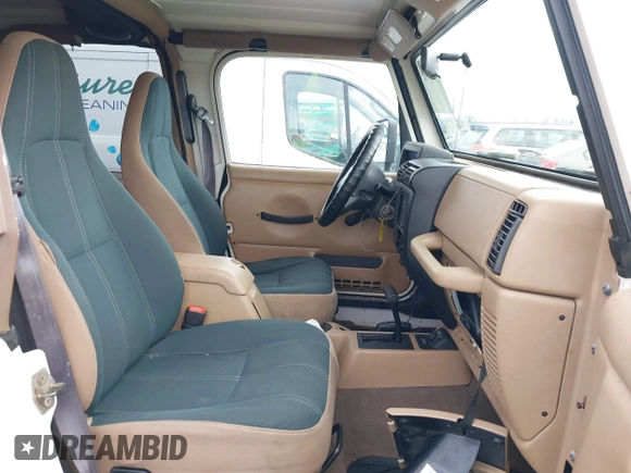 2002 Jeep Wrangler Sahara with VIN 1J4FA59S02P760345, listed as a IAAI auction lot 41634902 with 123,506 mi miles. Bid and sale history available at carsss.com. Image 5.