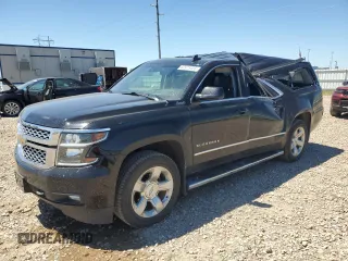 2018 Chevrolet Suburban LT with VIN 1GNSKHKC7JR405186, listed as a Copart auction lot 62915405 with 153,602 mi miles and Salvage title. Bid and sale history available at DreamBid. Image 1.