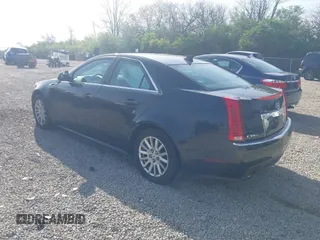 2012 Cadillac CTS with VIN 1G6DC5E57C0125644, listed as a IAAI auction lot 42055040 with 115,788 mi miles and . Bid and sale history available at DreamBid. Image 3.