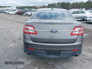 2014 Ford Taurus SE z VIN 1FAHP2D88EG143275, wystawiony jako IAAI lot #41801787 z przebiegiem 150 988 mil mil oraz . Historia ofert i sprzedaży dostępna na DreamBid. Obrazek 17.