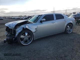 2005 Chrysler 300 C with VIN 2C3AA63H15H674199, listed as a Copart auction lot 47628215 with 154,052 mi miles and Salvage Title. Bid and sale history available at DreamBid. Image 1.
