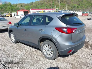 2013 Mazda CX-5 Sport with VIN JM3KE4BE0D0125748, listed as a IAAI auction lot 42143020 with 158,580 mi miles. Bid and sale history available at carsss.com. Image 3.