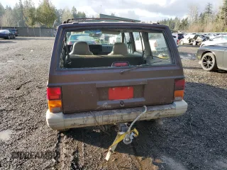 1996 Jeep Cherokee Sport with VIN 1J4FJ68SXTL269085, listed as a Copart auction lot 89119215 with 254,679 mi miles and Clean Title. Bid and sale history available at carsss.com. Image 6.