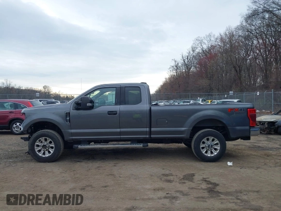2021 Ford Super Duty F-250 SRW XL with VIN 1FT7X2B63MEC04131, listed as a IAAI auction lot 41864148 with 129,452 mi miles. Bid and sale history available at carsss.com. Image 14.
