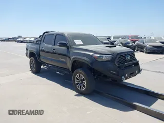 2023 Toyota Tacoma 4WD SR with VIN 3TYCZ5AN0PT110522, listed as a IAAI auction lot 41740128 with 45,115 mi miles. Bid and sale history available at carsss.com. Image 1.