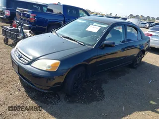 2001 Honda Civic LX with VIN JHMES16541S006574, listed as a IAAI auction lot 42162269 with 219,680 mi miles. Bid and sale history available at carsss.com. Image 2.
