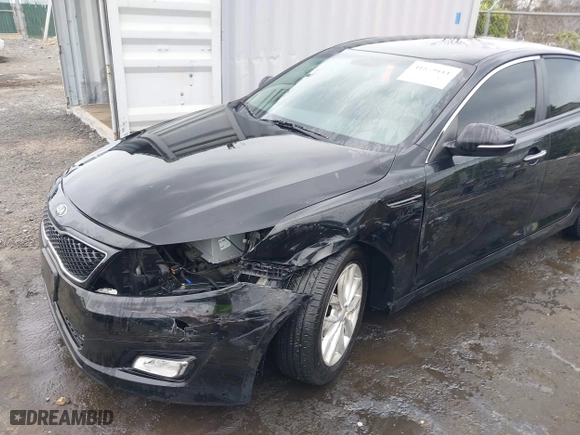 2015 Kia Optima LX with VIN 5XXGM4A79FG442899, listed as a IAAI auction lot 41859111 with 169,130 mi miles. Bid and sale history available at carsss.com. Image 6.