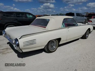 1961 Ford Thunderbird with VIN 1Y73Z112797, listed as a Copart auction lot 77574894 with 22,246 mi miles and Salvage Title. Bid and sale history available at DreamBid. Image 3.