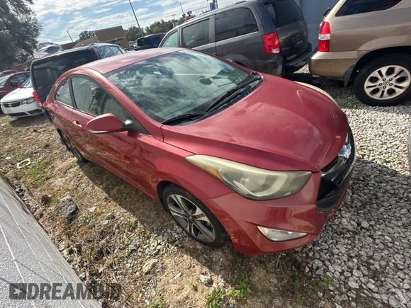 2014 Hyundai Elantra Coupe with VIN KMHDH6AH9EU025573, listed as a Copart auction lot 87049884 with 103,713 mi miles and Clean Title. Bid and sale history available at carsss.com. Image 1.