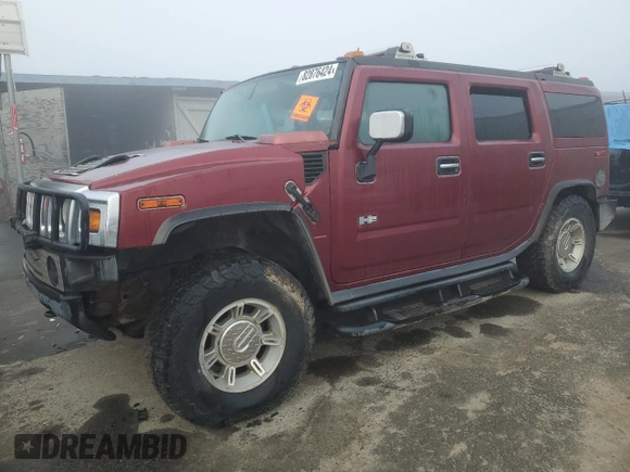2003 Hummer H2 with VIN 5GRGN23UX3H147490, listed as a Copart auction lot 82876424 with 241,737 mi miles and Clean Title. Bid and sale history available at carsss.com. Image 1.