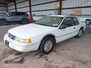 1992 Mercury Cougar z VIN 1MEPM6045NH646487, wystawiony jako IAAI lot #42345310 z przebiegiem 72 579 mil mil oraz . Historia ofert i sprzedaży dostępna na DreamBid. Obrazek 2.