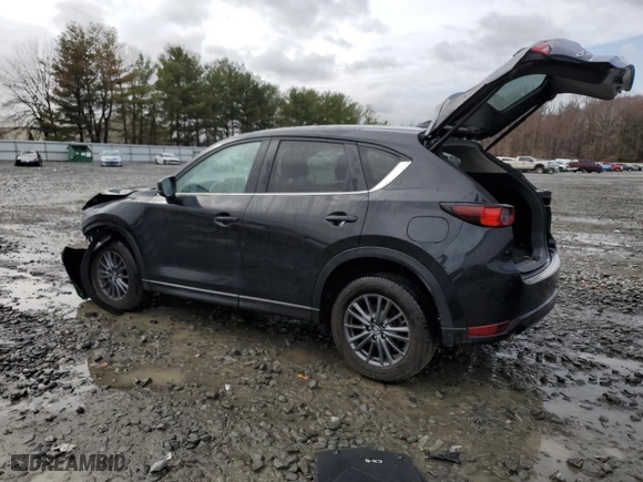 2021 Mazda CX-5 Touring with VIN JM3KFBCM1M0407582, listed as a Copart auction lot 48800825 with 39,615 mi miles and Salvage Title. Bid and sale history available at carsss.com. Image 2.