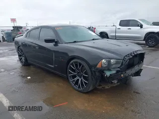2014 Dodge Charger RT z VIN 2C3CDXCT0EH350011, wystawiony jako IAAI lot #41907132 z przebiegiem 145 201 mil mil oraz . Historia ofert i sprzedaży dostępna na DreamBid. Obrazek 1.