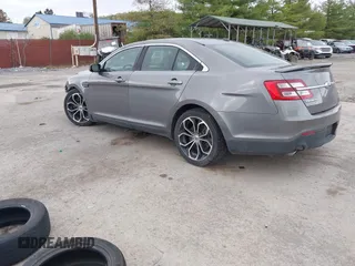 2014 Ford Taurus SHO with VIN 1FAHP2KTXEG160800, listed as a IAAI auction lot 42083237 with 75,048 mi miles. Bid and sale history available at carsss.com. Image 3.