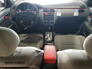 2008 Suzuki Forenza z VIN KL5JD56Z98K859749, wystawiony jako Copart lot #77630514 z przebiegiem 202 609 mil mil oraz Szkody całkowita. Historia ofert i sprzedaży dostępna na DreamBid. Obrazek 8.