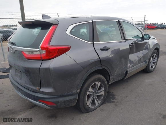 2017 Honda CR-V LX with VIN 7FARW5H32HE002156, listed as a IAAI auction lot 41697635 with 68,125 mi miles. Bid and sale history available at carsss.com. Image 4.