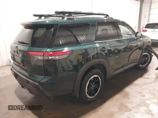 2024 Nissan Pathfinder Rock Creek with VIN 5N1DR3BD7RC301350, listed as a IAAI auction lot 41726175 with 5,304 mi miles and . Bid and sale history available at DreamBid. Image 4.