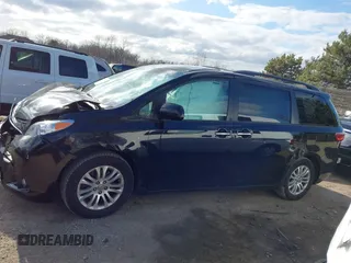 2015 Toyota Sienna XLE with VIN 5TDYK3DC2FS651400, listed as a IAAI auction lot 41985468 with 122,335 mi miles and . Bid and sale history available at DreamBid. Image 14.
