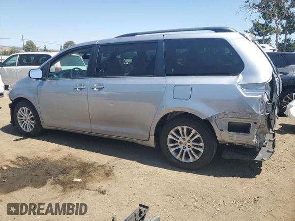 2012 Toyota Sienna XLE AAS with VIN 5TDYK3DC1CS204598, listed as a Copart auction lot 62293015 with 76,108 mi miles and Salvage title. Bid and sale history available at DreamBid. Image 2.