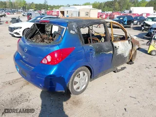 2009 Nissan Versa 1.8 S with VIN 3N1BC13E49L373669, listed as a IAAI auction lot 42028876 with 1 mi miles. Bid and sale history available at carsss.com. Image 4.