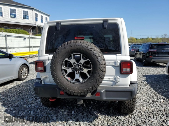 2023 Jeep Wrangler Rubicon with VIN 1C4HJXCG9PW505608, listed as a Copart auction lot 54429105 with 5,461 mi miles and Salvage title. Bid and sale history available at DreamBid. Image 6.