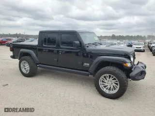2023 Jeep Gladiator Overland with VIN 1C6HJTFG2PL559314, listed as a Copart auction lot 44985505 with 9,434 mi miles and Salvage Title. Bid and sale history available at carsss.com. Image 4.