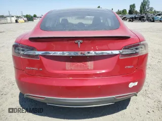 2014 Tesla Model S 60 with VIN 5YJSA1H17EFP29100, listed as a Copart auction lot 65081725 with 130,377 mi miles and Clean title. Bid and sale history available at DreamBid. Image 6.