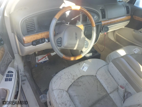 2000 Lincoln Continental with VIN 1LNHM97V0YY795279, listed as a Copart auction lot 76456684 with 0 mi miles and Salvage Title. Bid and sale history available at carsss.com. Image 8.