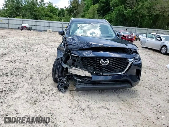 2025 Mazda CX-90 Select with VIN JM3KKAHDXS1210948, listed as a Copart auction lot 56128695 with 7,193 mi miles and Salvage title. Bid and sale history available at DreamBid. Image 14.