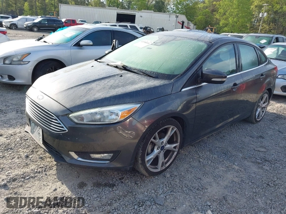 2016 Ford Focus Titanium with VIN 1FADP3J25GL282293, listed as a IAAI auction lot 41998959 with 119,781 mi miles and . Bid and sale history available at DreamBid. Image 2.