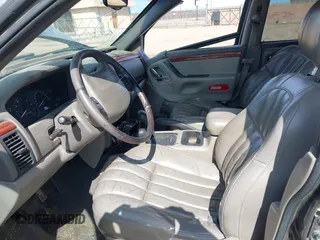 1999 Jeep Grand Cherokee Limited with VIN 1J4GW68N5XC773100, listed as a IAAI auction lot 41998432 with Not provided miles and . Bid and sale history available at DreamBid. Image 5.
